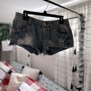 Destroyed look, beaded and gemmed booty shorts, jean.